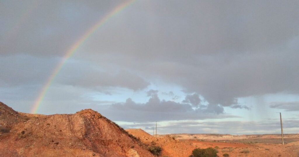 The rainbow near Coober Pedy is the symbol that matches Janet Walton's approach to Bowen Therapy in the town